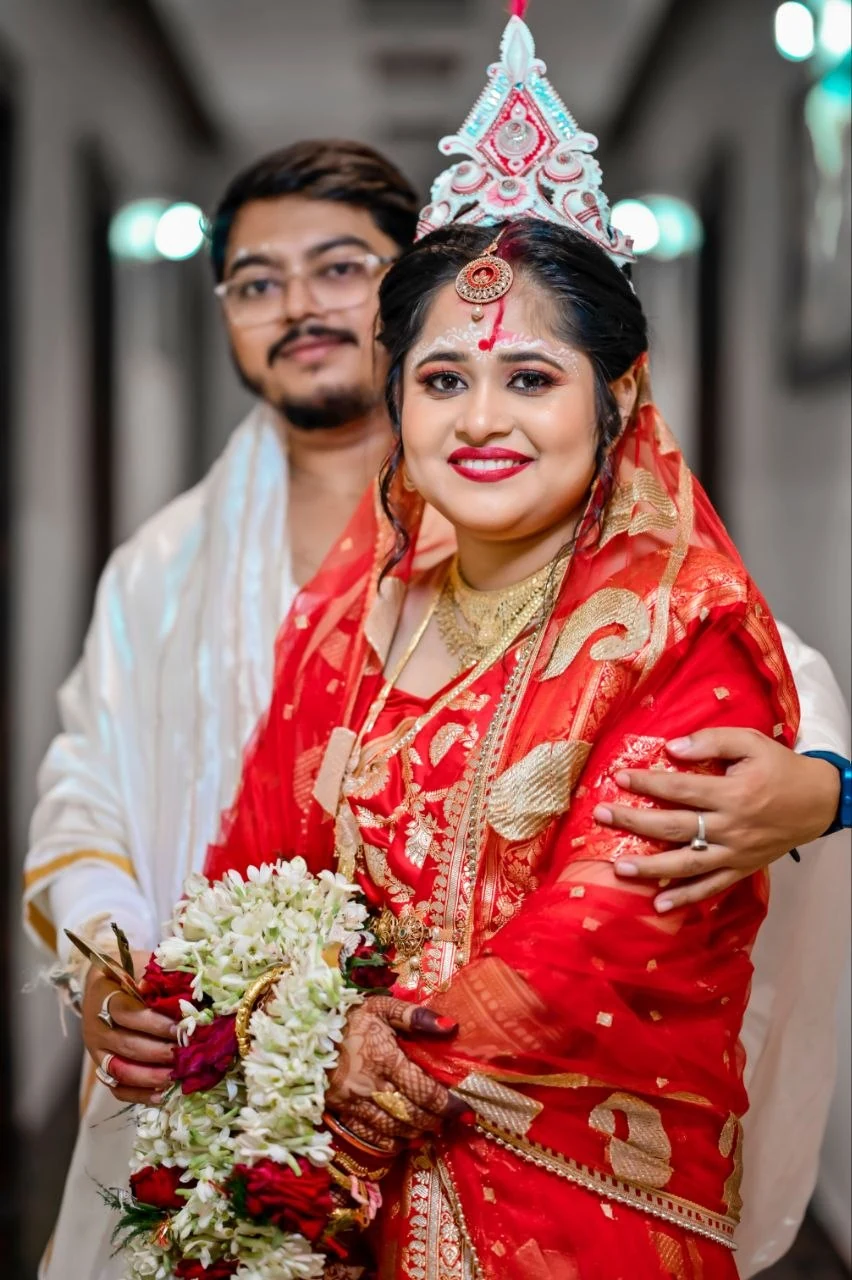 Bride and groom in corridor